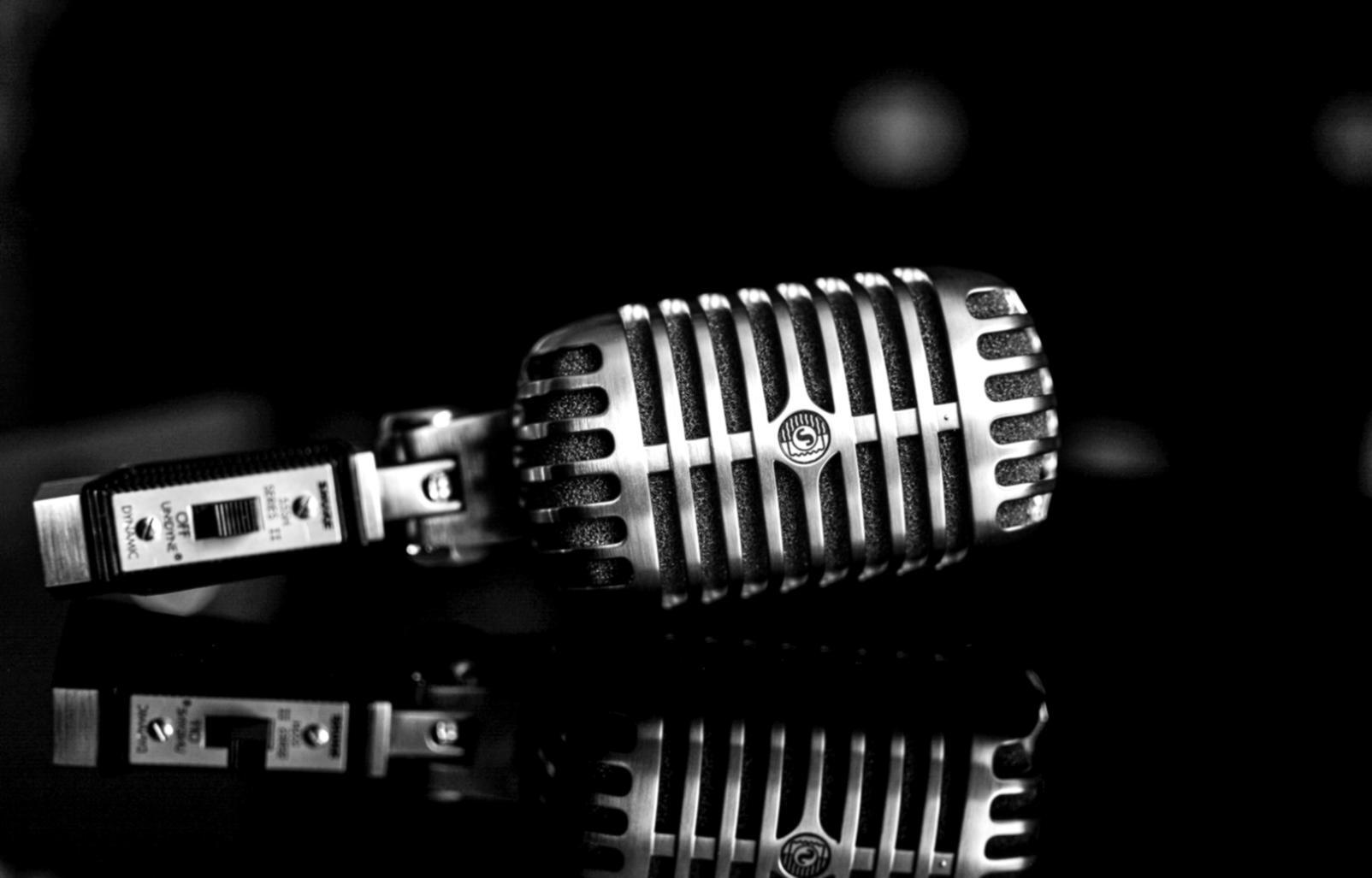 Students reviewing published work and discussing editorial decisions in a collaborative learning environment